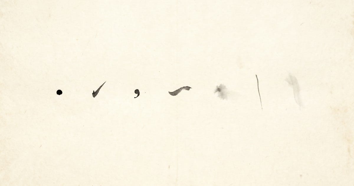 Seven tiny isolated ink marks scattered across vast empty cream washi paper, like notated pauses on an empty staff.